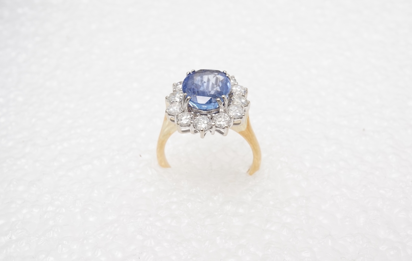 A sapphire and diamond cluster ring